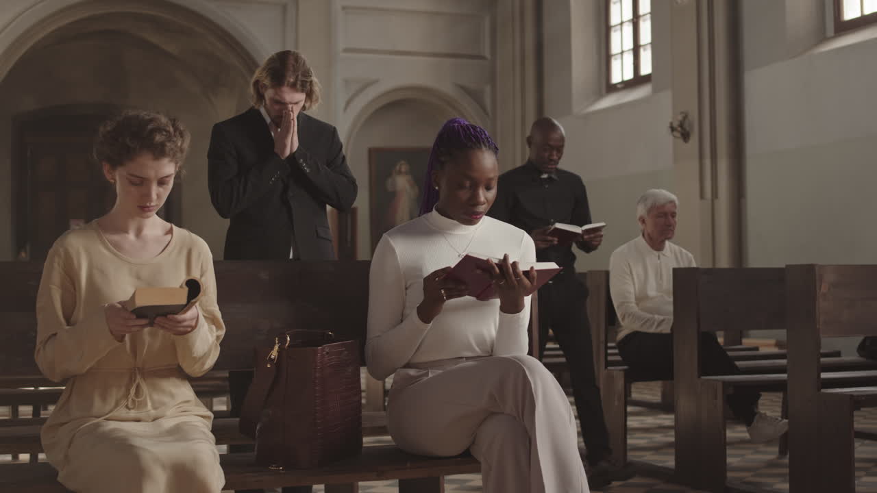 Parishioners Praying while African Priest Going along Christian Church