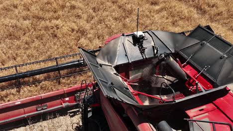 step into the world of cutting-edge machinery during a large-scale canola harvesting operation