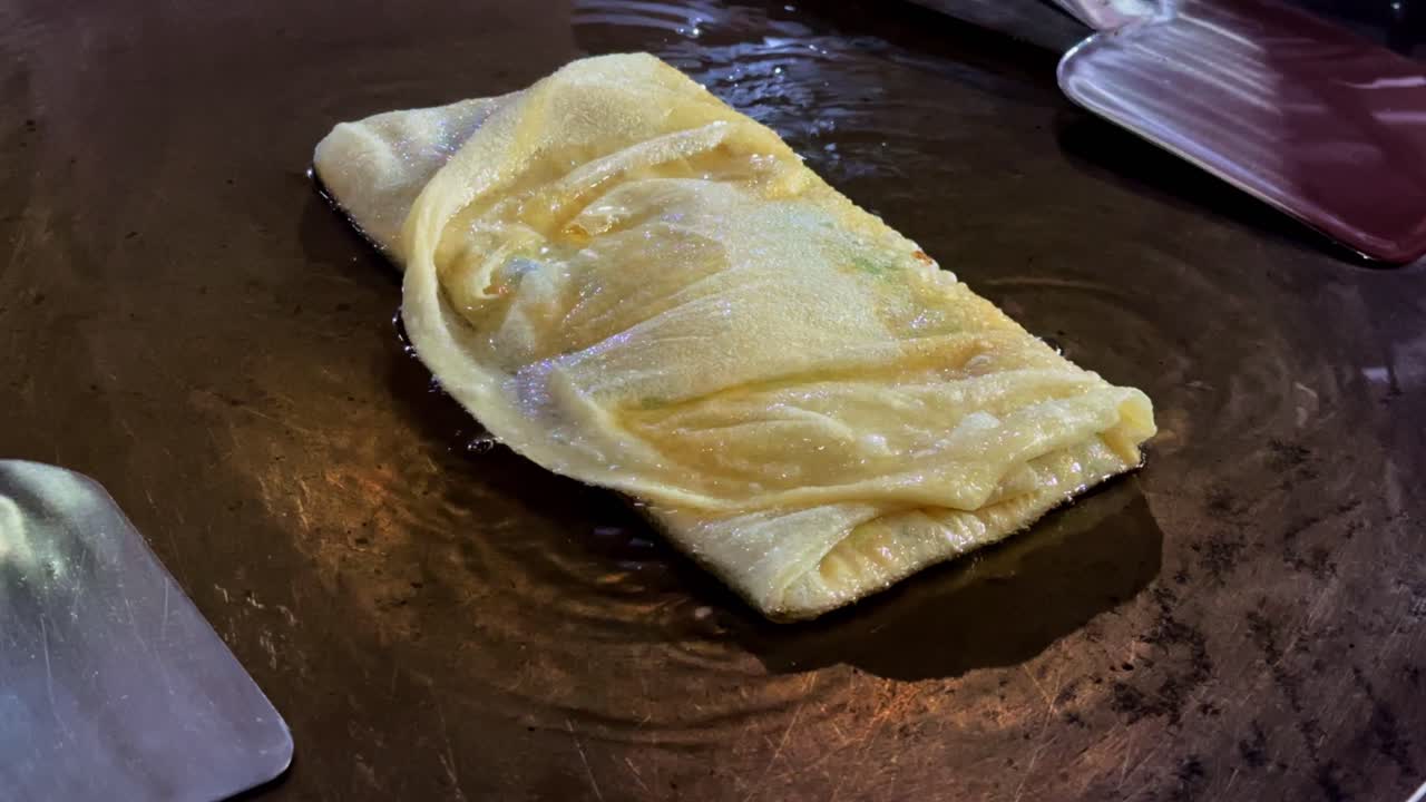 Cooking Roti or Flatbread on a Griddle