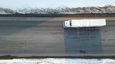 Truck-Crossing-Snowy-Road