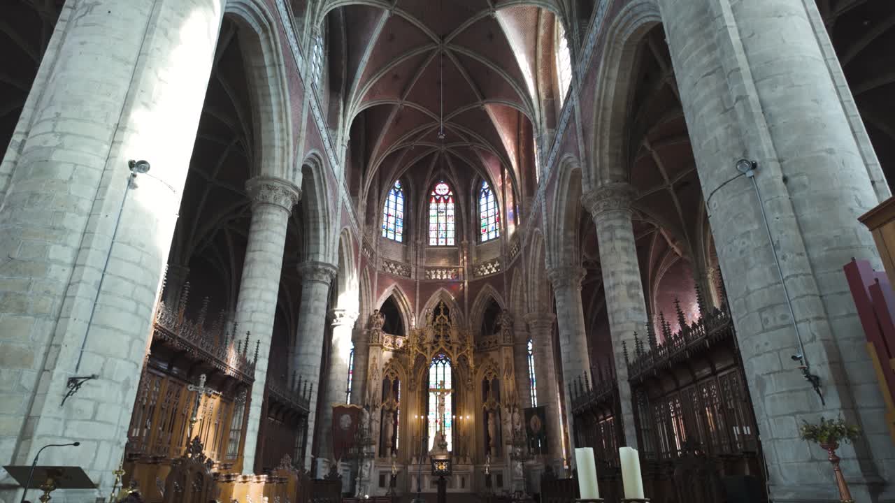 A stunning view of Saint Michael's Church in Ghent, Belgium with grand Gothic arches