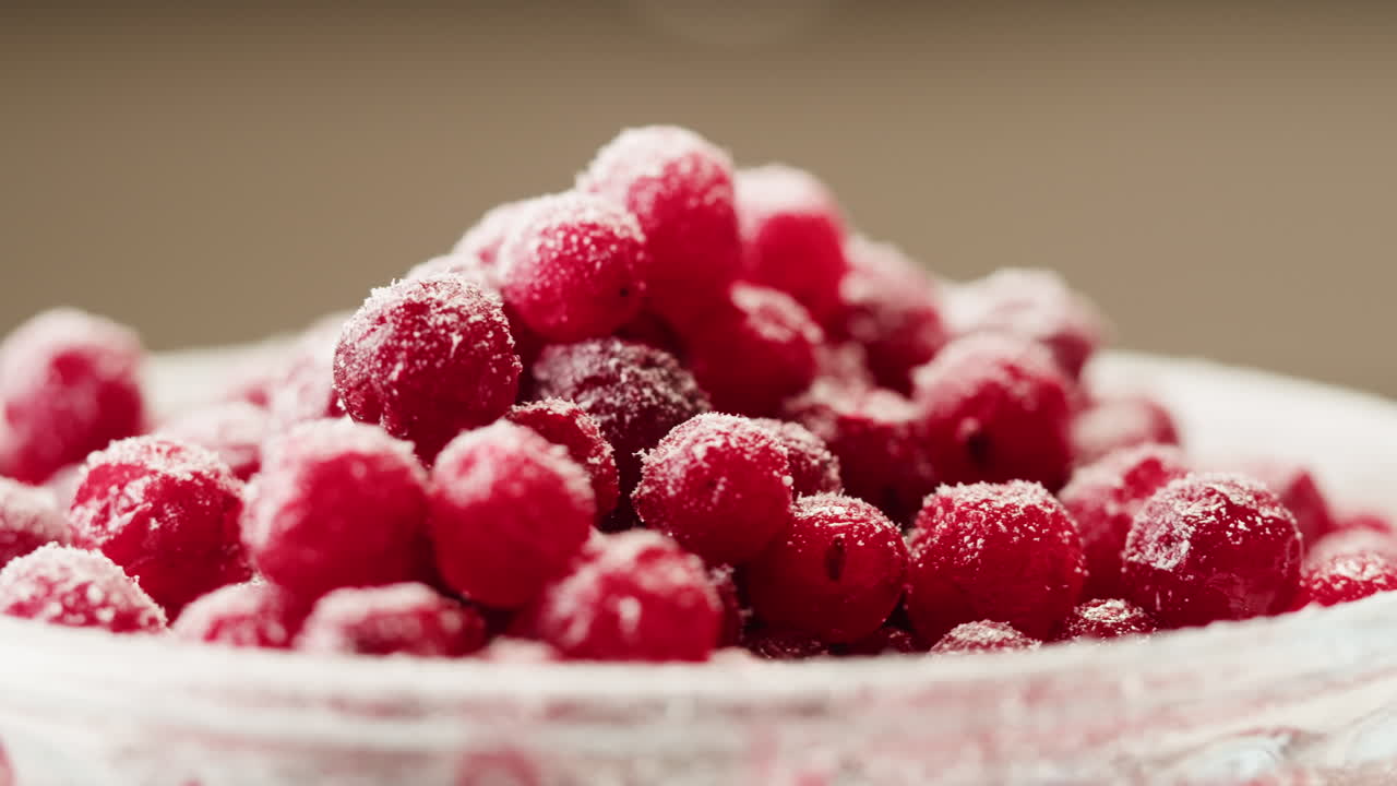 Frozen cranberries cooking for tea or jam, Background Close up of cranberry berries in on the kitchen, chef making dessert healthy pie.