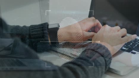 Animation-of-fingerprint,-connected-dots-against-cropped-hands-of-asian-man-working-on-laptop