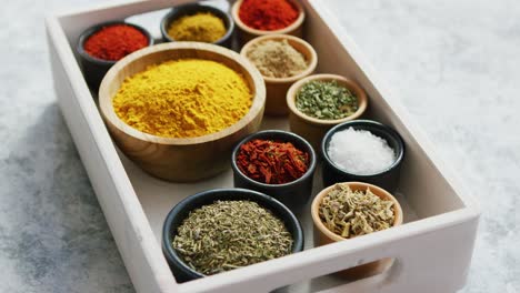 wooden box with assortment of spices