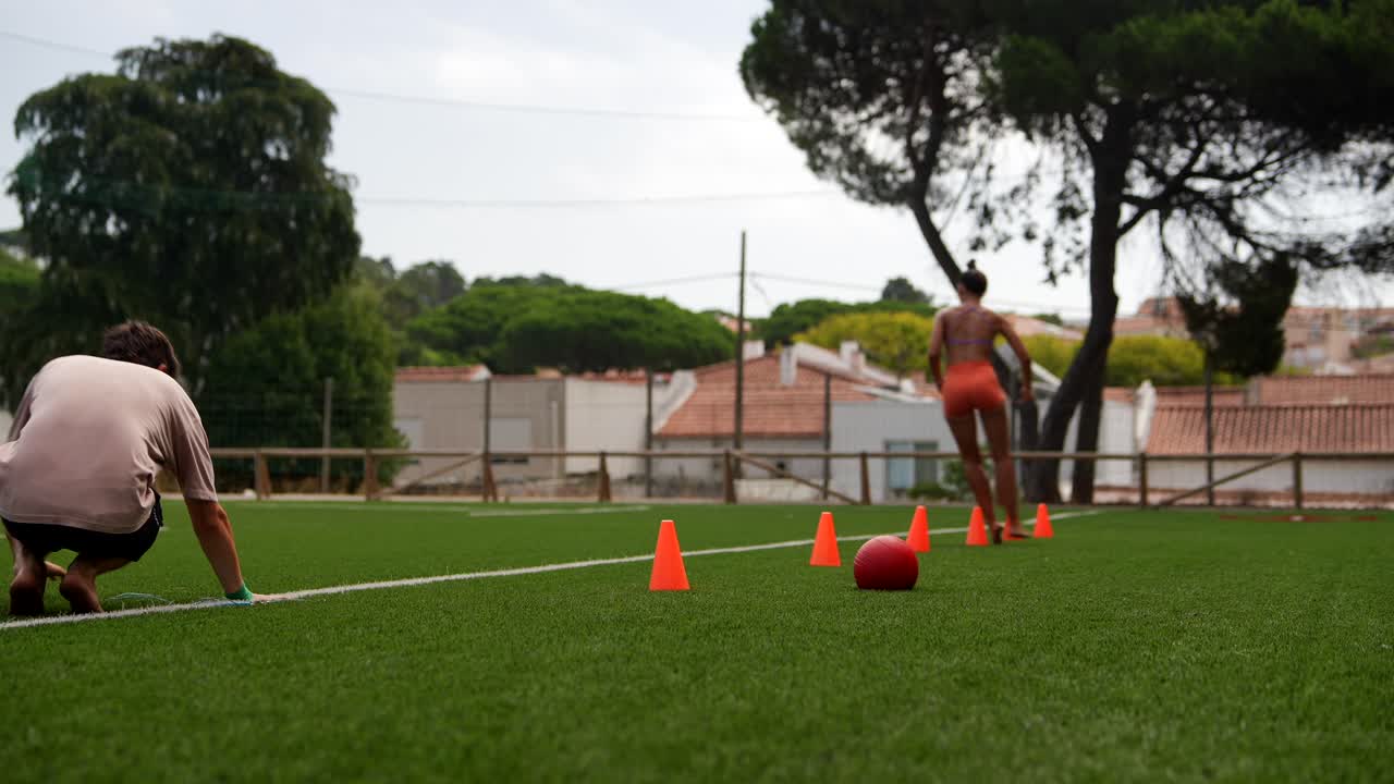 Outdoor fitness training on grass field