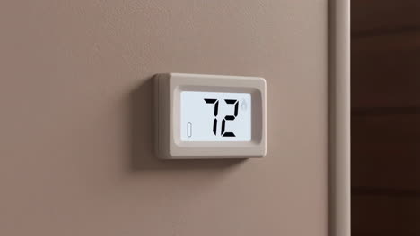digital thermostat displaying 72 degrees