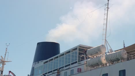 Skiathos-Greece-September-2022-Ferry-Funnel-Smoking-Whilst-Waiting-For-Passengers-To-Board-At-Skiathos-Island-Sporades-On-Clear-Sunny-Day