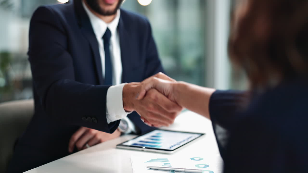 Business handshake during meeting