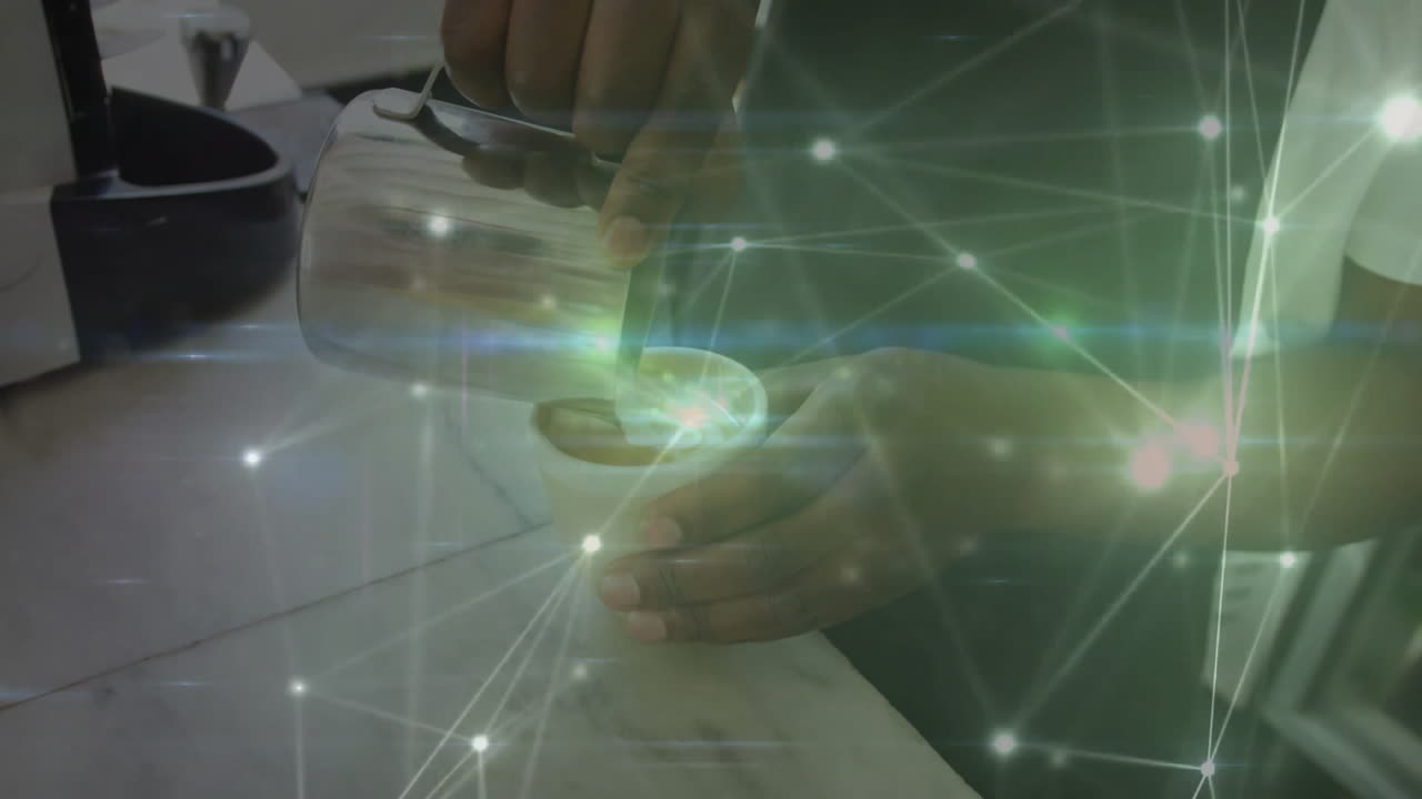 Hands stirring hot beverage on countertop, displaying technology network light flares overlay