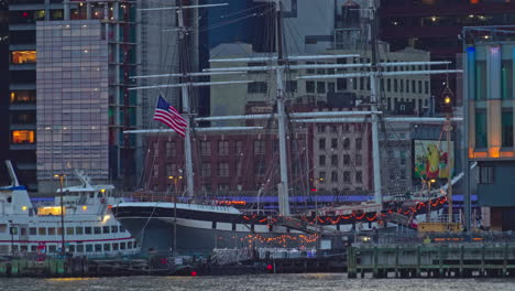 the manhattan skyline rises over the east river