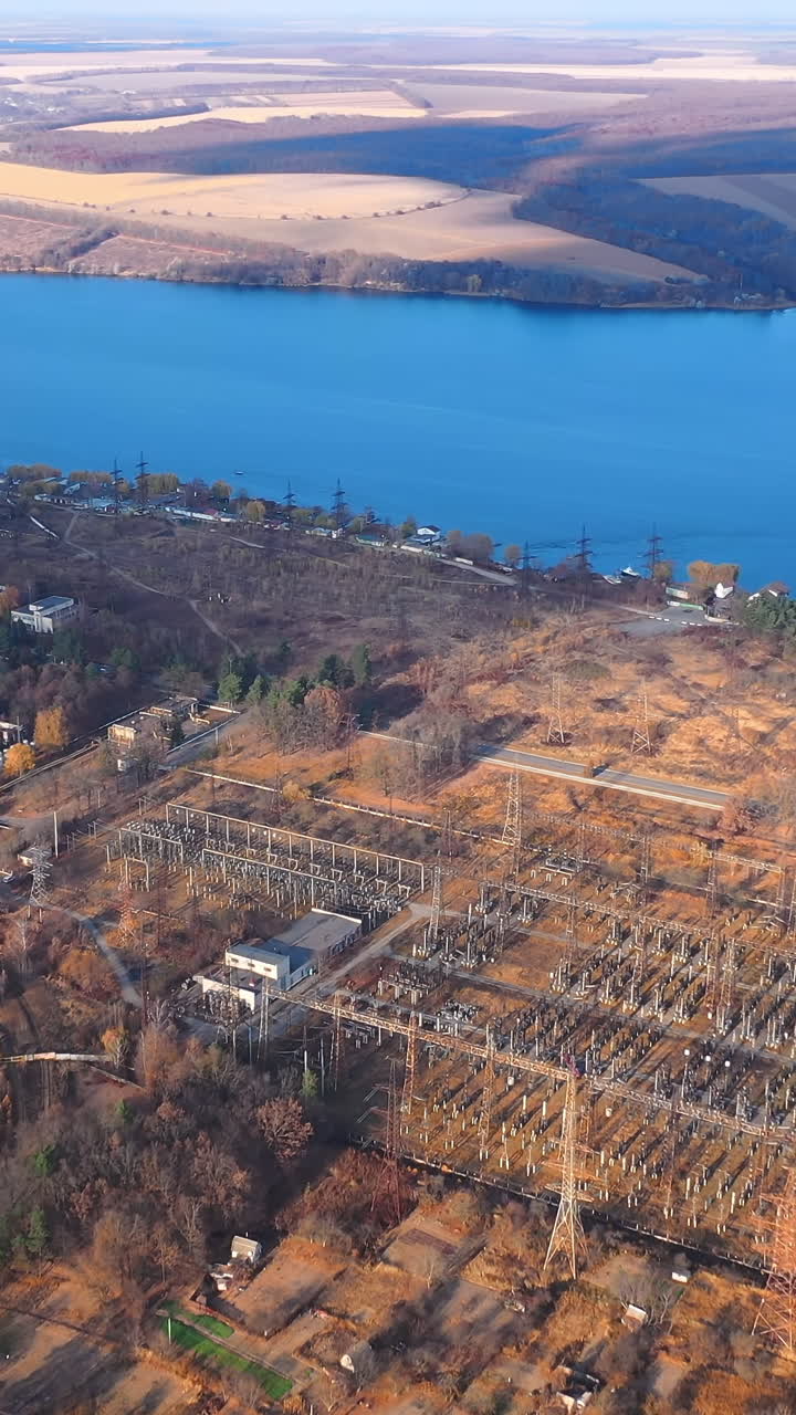 Aerial view of autumn season landscapes. Drone view of tree forest and lake.