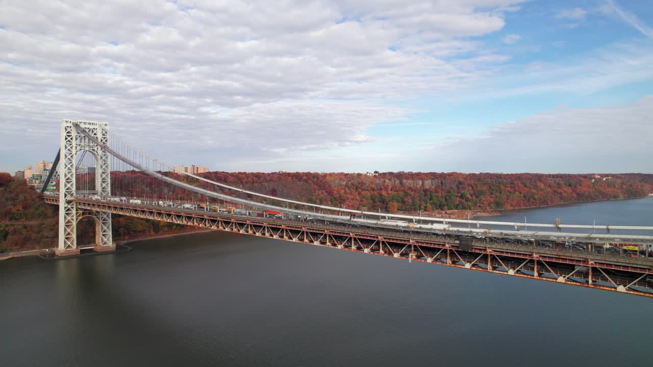New Jersey side of GWB with Palisades in fall colors, 4K aerial