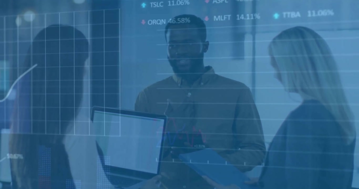 Animation of graphs and trading boards over diverse coworkers standing and discussing reports