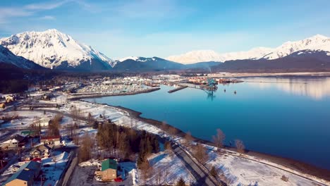 4K-Drone-Video-of-Homes-in-Seward,-Alaska-on-a-Snowy-Winter-day