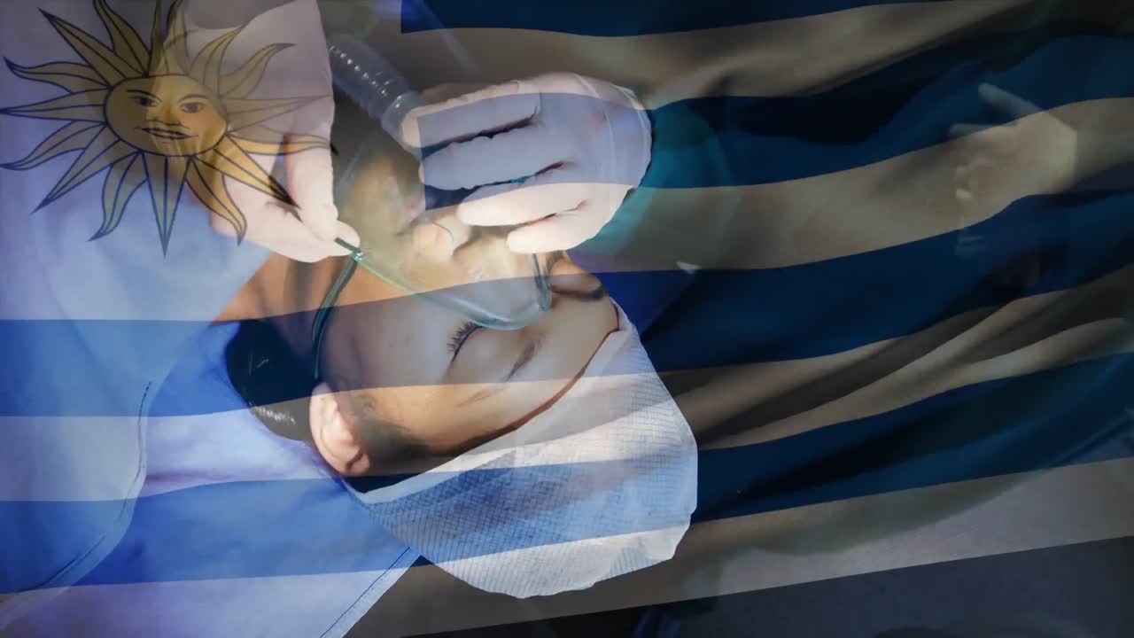 animación de la bandera de uruguay ondeando sobre los cirujanos en la sala de operaciones