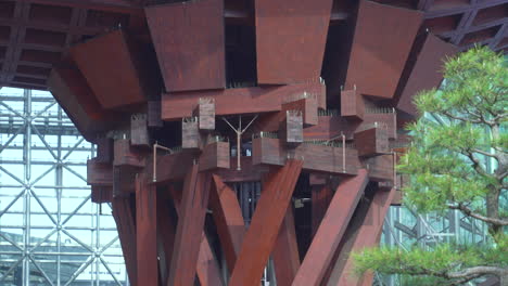 close up detail of the pillar of tsuzumi gate at jr kanazawa station east entrance in kanazawa, japan