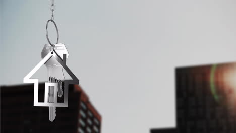 house keychain animation over blurred cityscape background