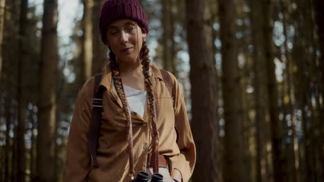 woman exploring forest during vacation