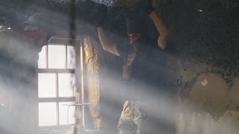 soldiers in a ruined building