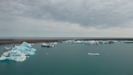 drone shot of the yokulsarlon glacier lake in iceland 4