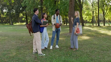 students talking in a park