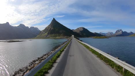 driving a car on a road in norway lofoten. fredvang bridges lofoten islands.