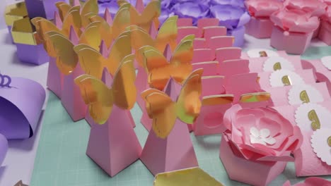 colorful handmade gift boxes, pink and violet paper crafts display