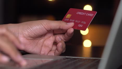 women shopping on mobile phone with credit card , using phone and holding credit card with green screen