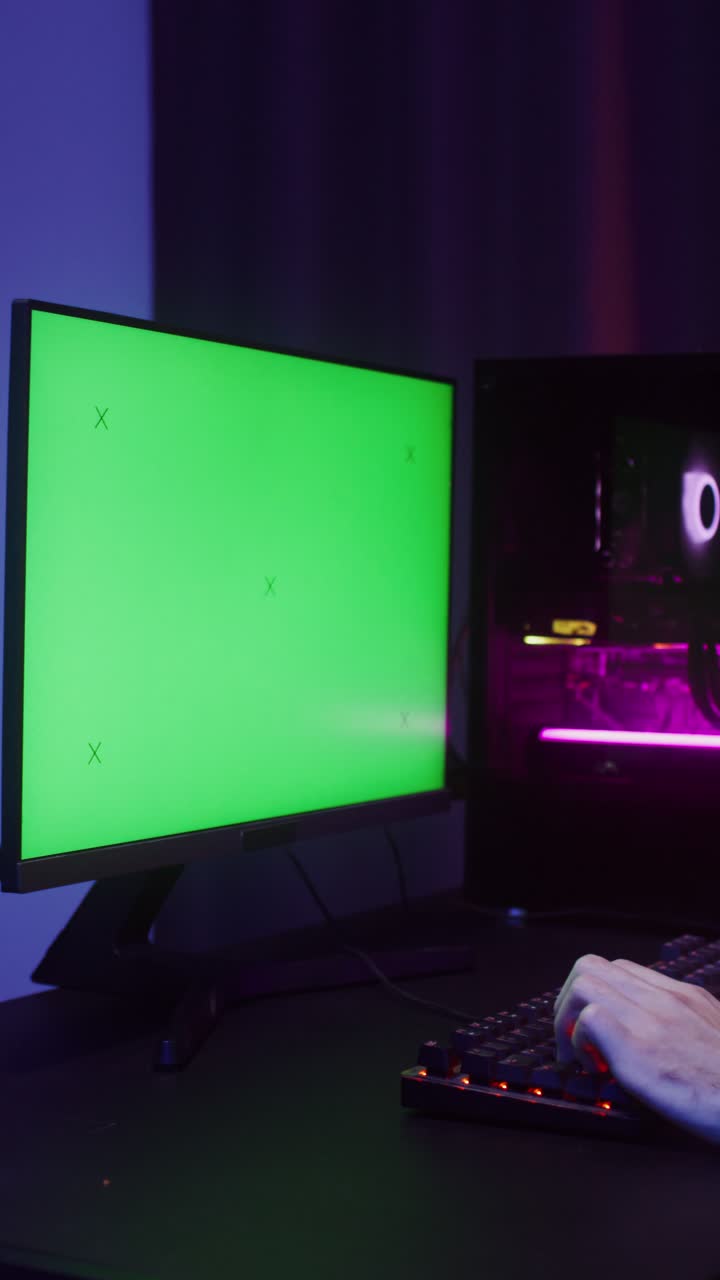 Gaming PC setup with a green screen