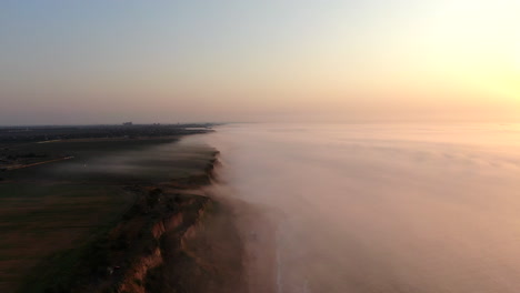 A-foggy-sunrise-on-the-sea-shore