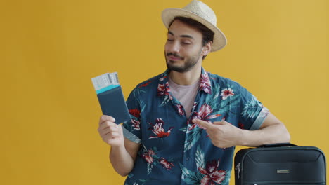 man ready for vacation with passport and tickets