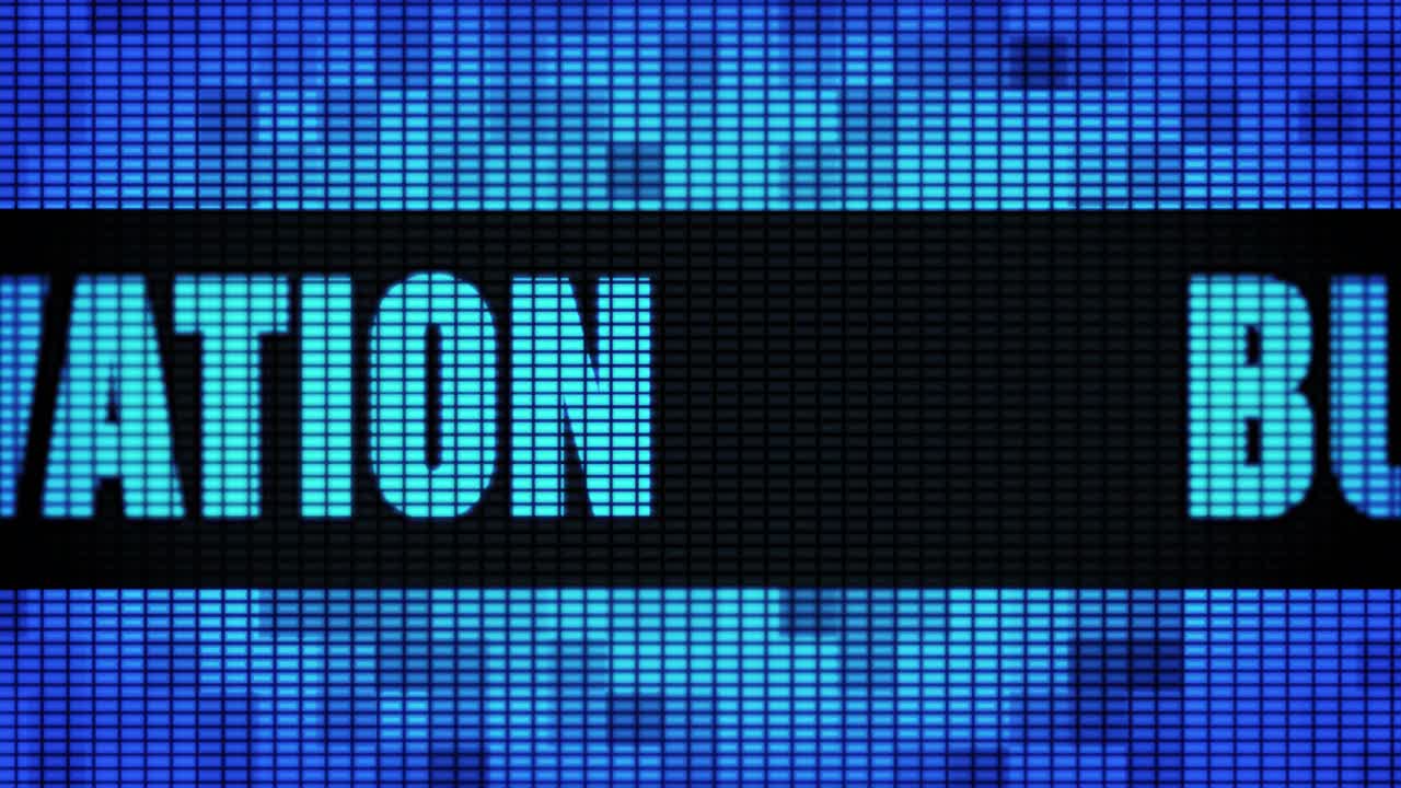 Business innovation text scrolling on light blue digital led display board pixel light screen looped