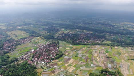 beautiful towns of indonesia in vast landscape, aerial drone view