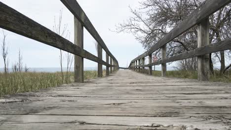 Point-of-View-of-a-boardwalk,-descending