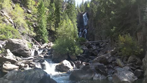 creek waterfall aerial smooth canyon flyover, fish creek falls near steamboat springs