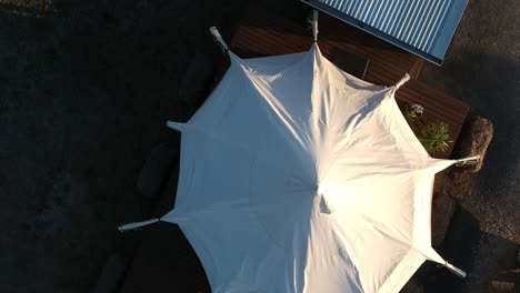 flying straight up above a glamping tent in the clare valley south australia