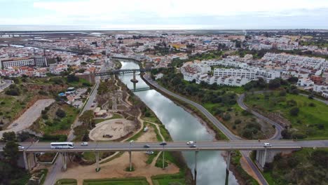 drone view of tavira algarve portugal,with the galao river flowing through the historic town to the atlantic sea