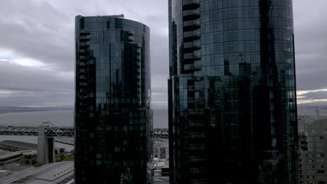modern skyscrapers and bay bridge in cityscape