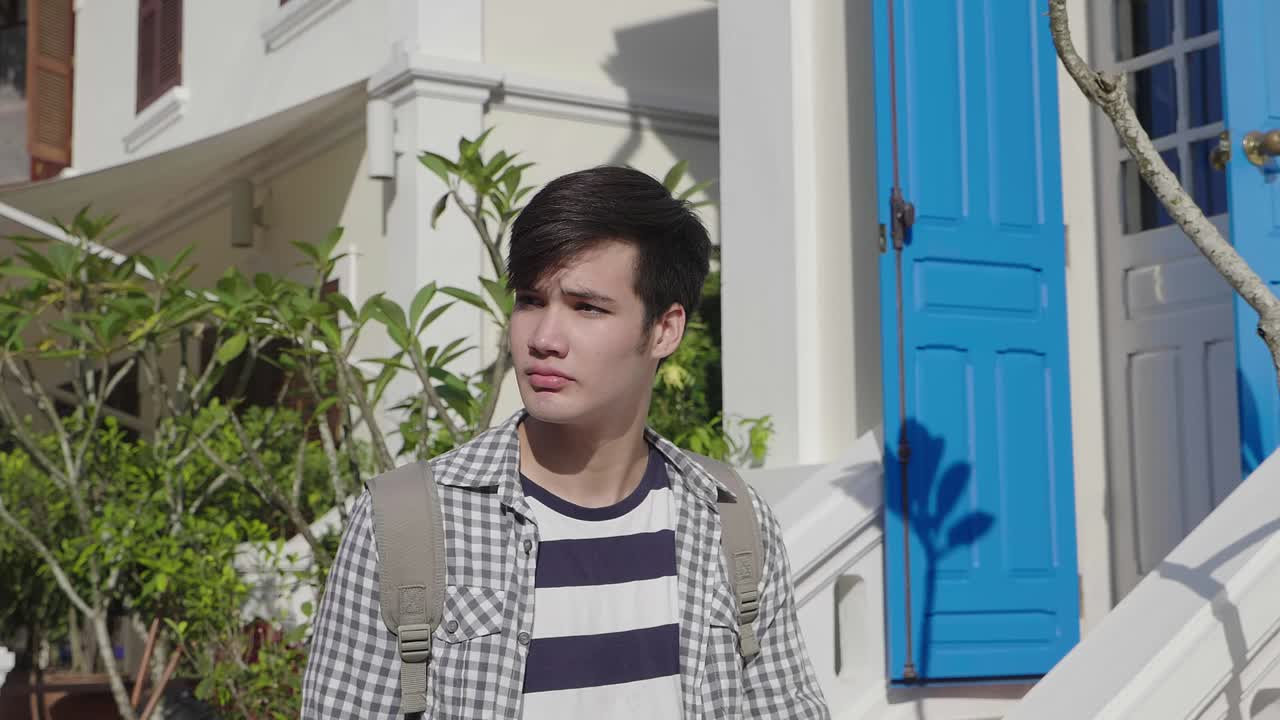 Young Man Exploring a City