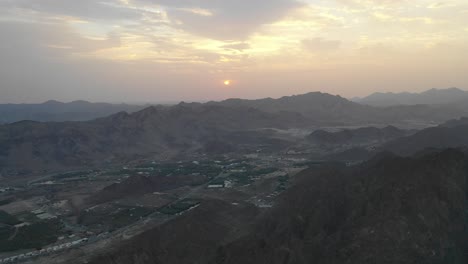 Aerial-view-of-an-amazing-endless-mountain-landscape-sunrise