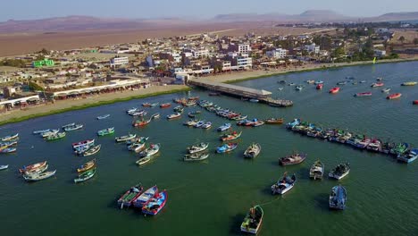 fishing boats at paracas bay in peru along the el chaco beach town