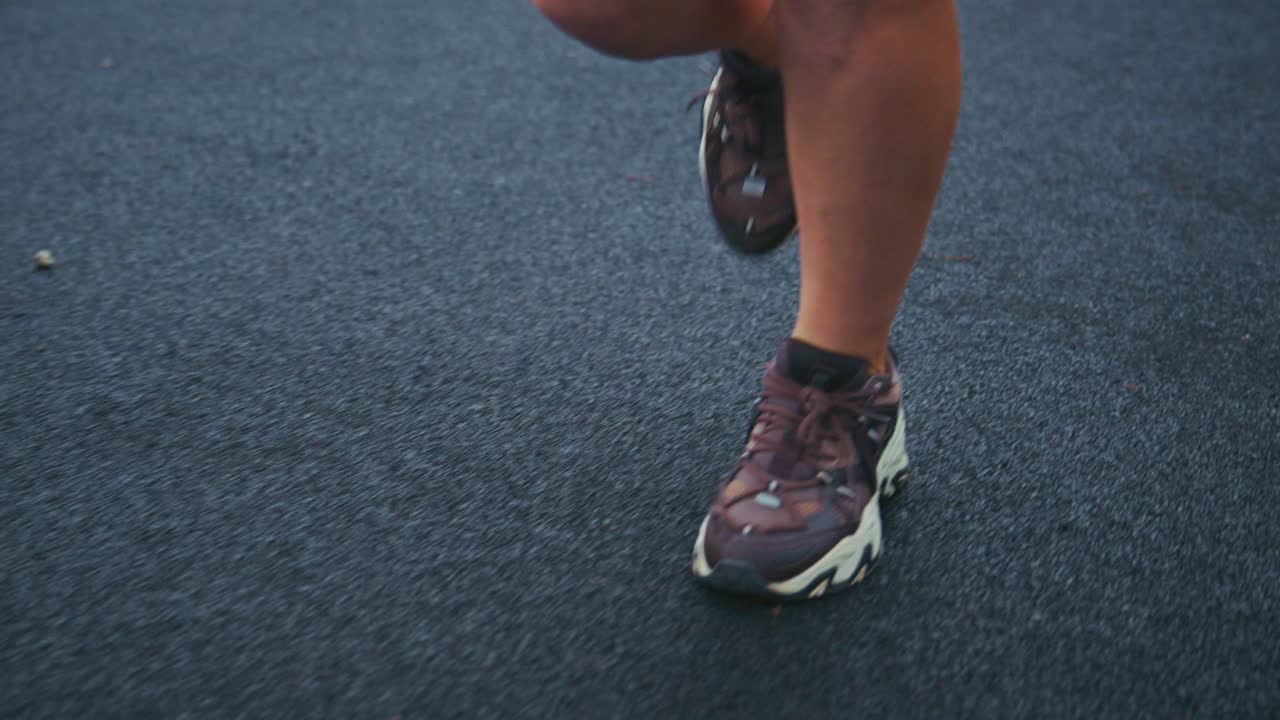 Running shoes on asphalt