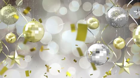 Animation-of-confetti-over-christmas-baubles