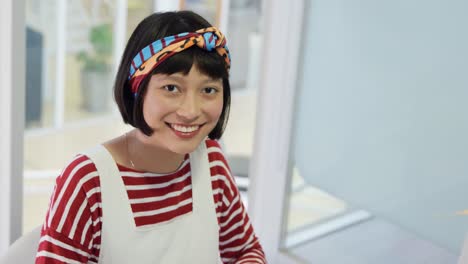 young woman working in a creative office