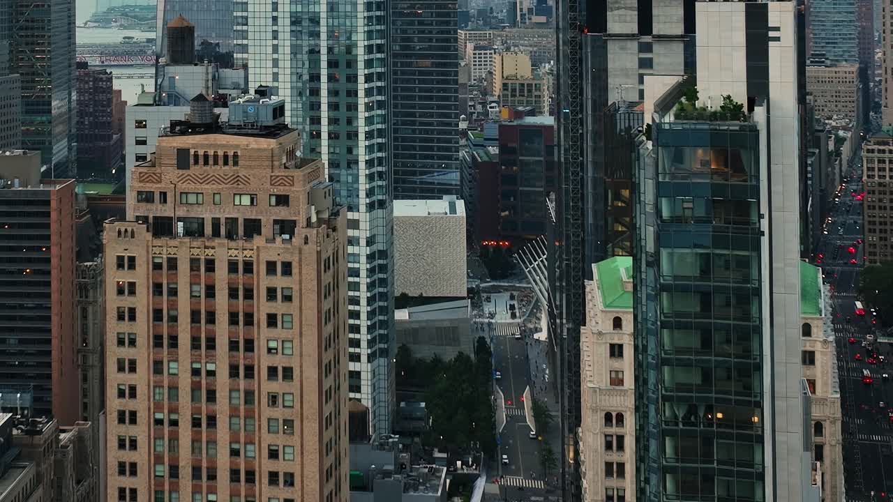 Drone view of busy New York City streets and tall buildings