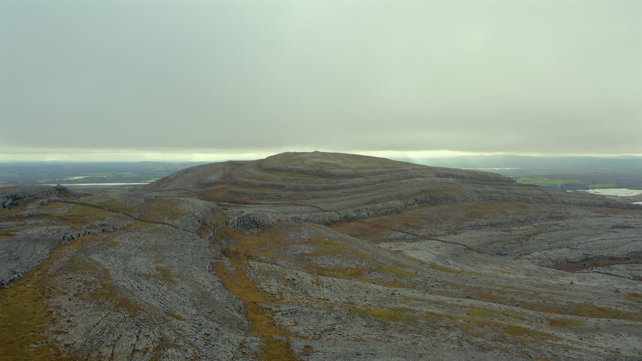 Aerial shot of Mullaghmore's vast vista, County Clare, with a misty sky