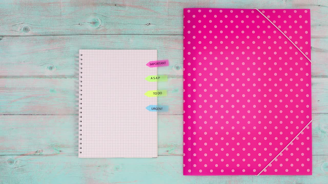 Blank papers enter in folder and office supplies appear on wooden table. Modern work place. Stop motion