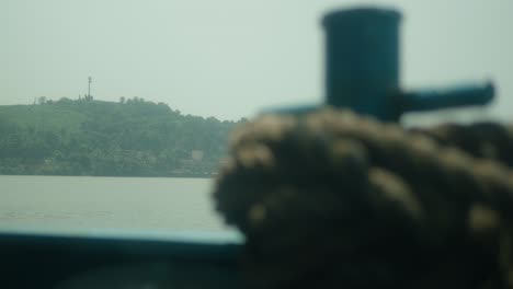 Rack-Focus-on-Boat-Rope-in-the-Harbor-on-a-Gloomy-Day-in-Goa,-India