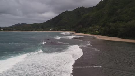 Dramatic-aerial-footage-of-famous-Haena-park-by-NaPali-coast-on-a-cloudy-day