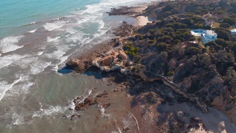 establishing aerial above praia de santa eulalia albufeira algarve portugal